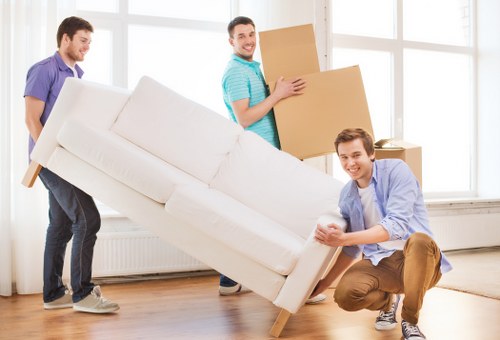 Loading boxes and furniture into a van for a local move in Marylebone