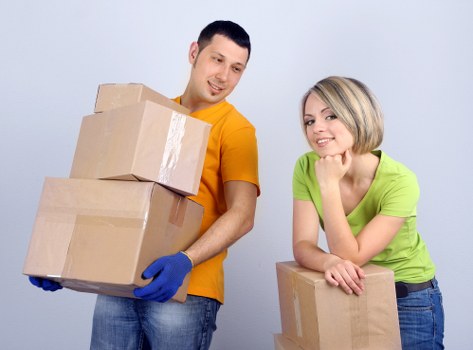 Packed boxes and furniture ready for removals in a Marylebone apartment