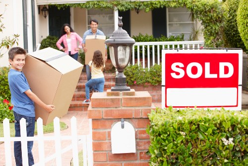 Professional movers handling boxes in Marylebone