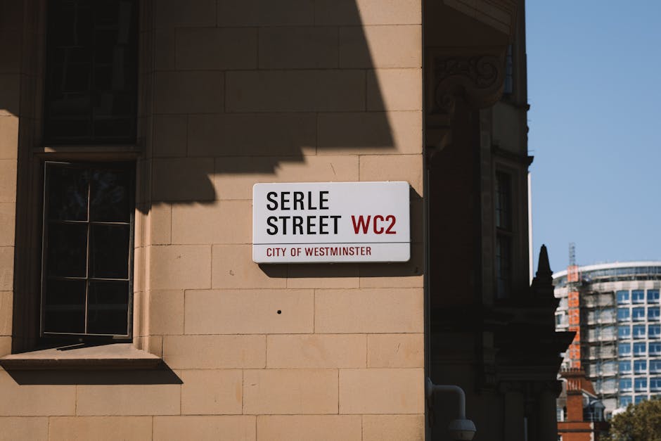 A red double-decker bus on a city street in London, with the destination sign displaying Westminster and route number 453. The bus is positioned in the foreground, with the front facing the camera, an